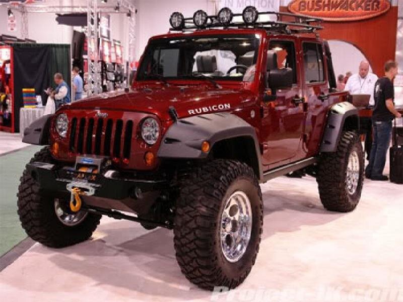 Red Jeep Rubicon at an auto show