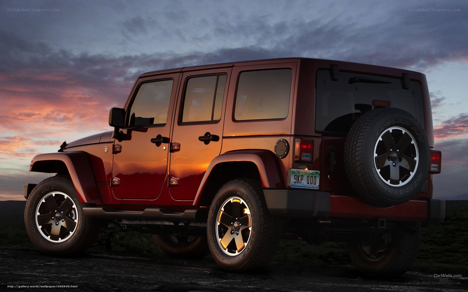 Red Jeep Wrangler at sunset