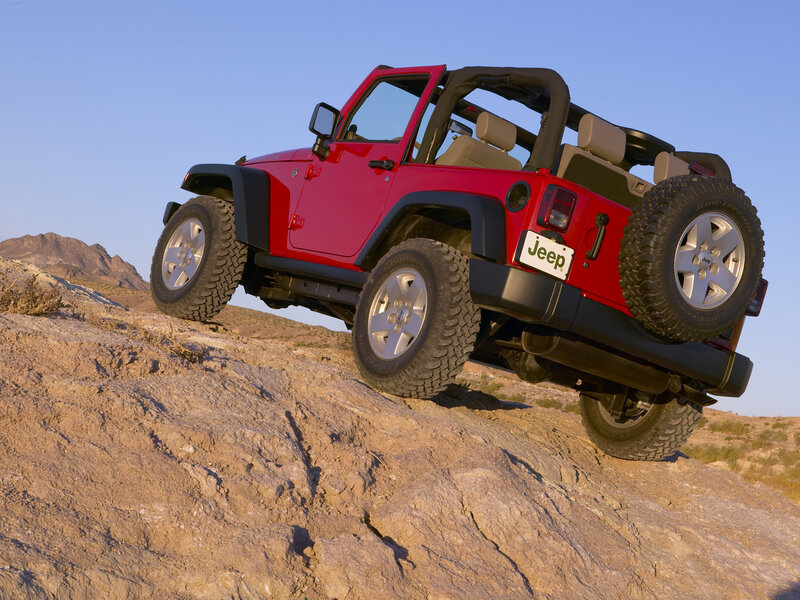 Red Jeep Wrangler — Dramatic, Afternoon, Photograph, Rocky Terrain