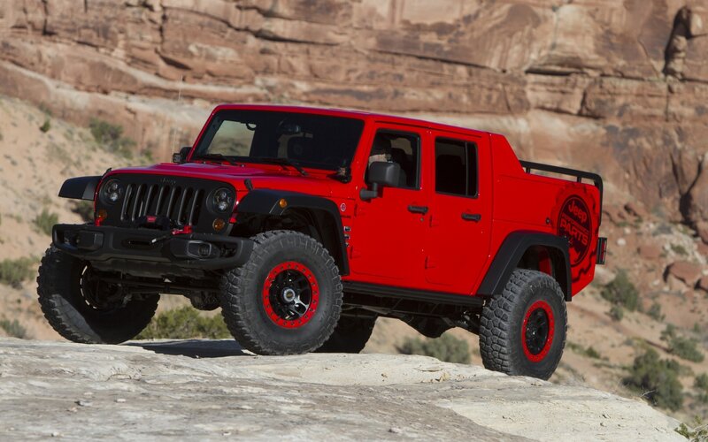 Red Jeep Wrangler pickup truck