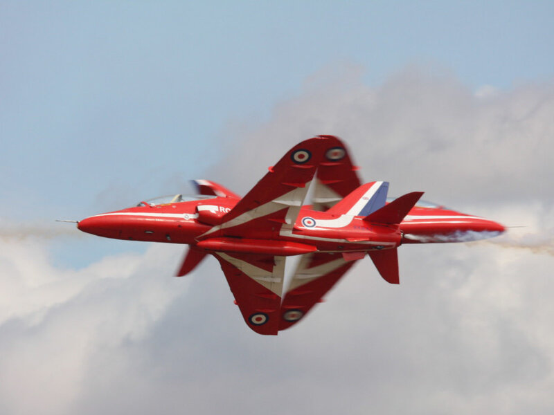 Red Jet Aircraft — Dynamic, Afternoon, Photograph, Smoke