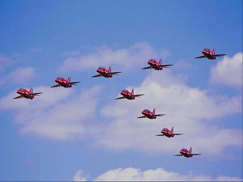 Red Jet Aircraft Formation — Dynamic, Afternoon, Photograph