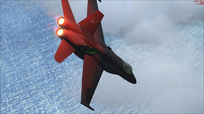 Red jet flying over ocean