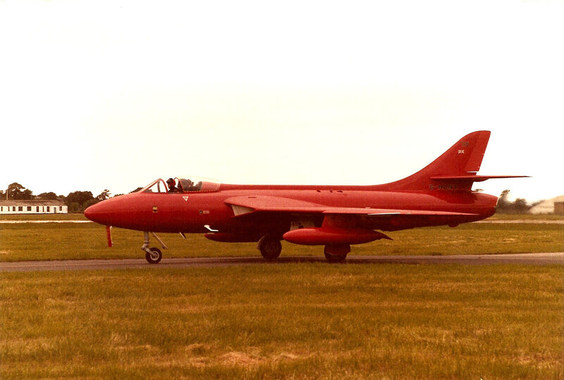 Red Jet on Runway — Calm