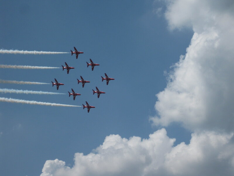 Red Jets in Formation — Blue, Dynamic, Afternoon
