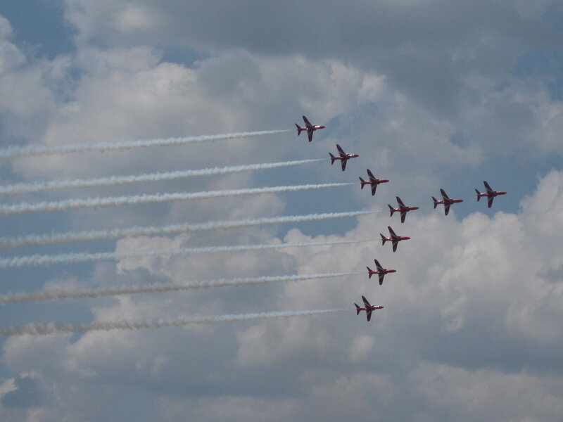 Red Jets in Formation — Dynamic, Afternoon, Photograph