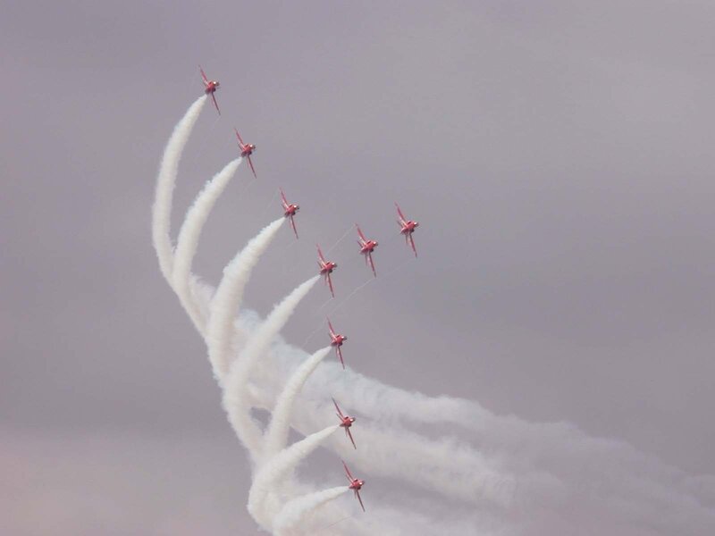 Red Jets in Formation — Dynamic, Photograph, Aircraft