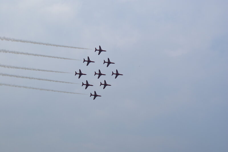 Red Jets in Formation — Gray, Dynamic, Photograph