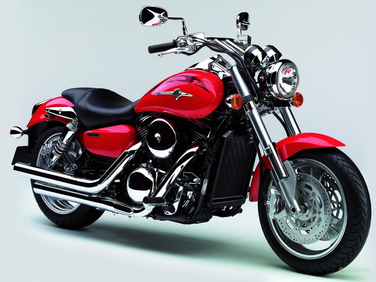 Red Kawasaki cruiser motorcycle