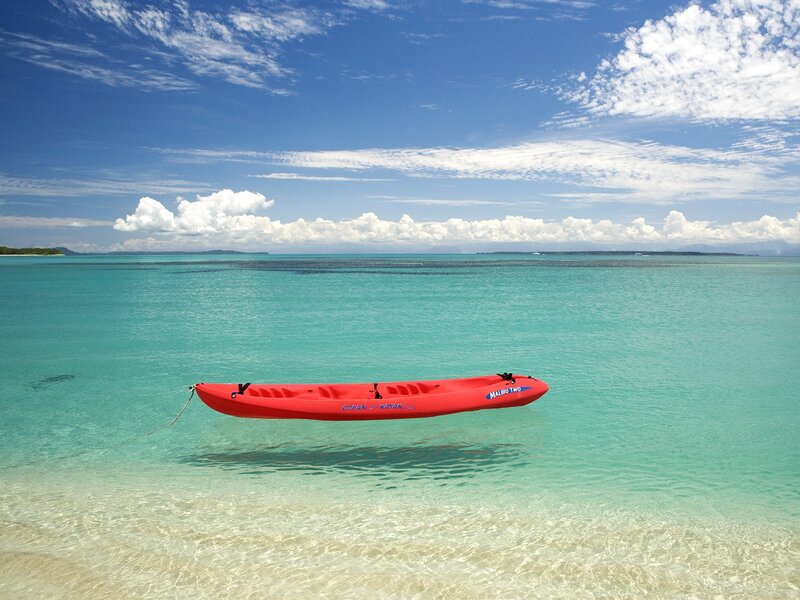Red kayak on turquoise water