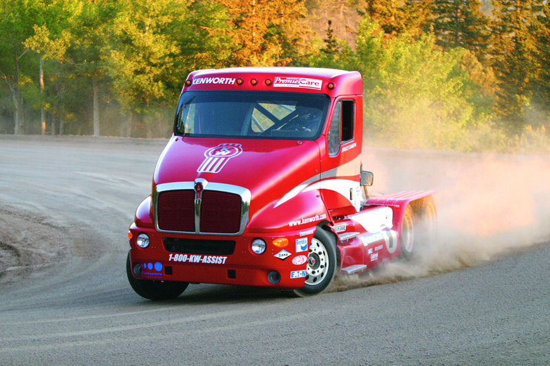 Red Kenworth truck racing