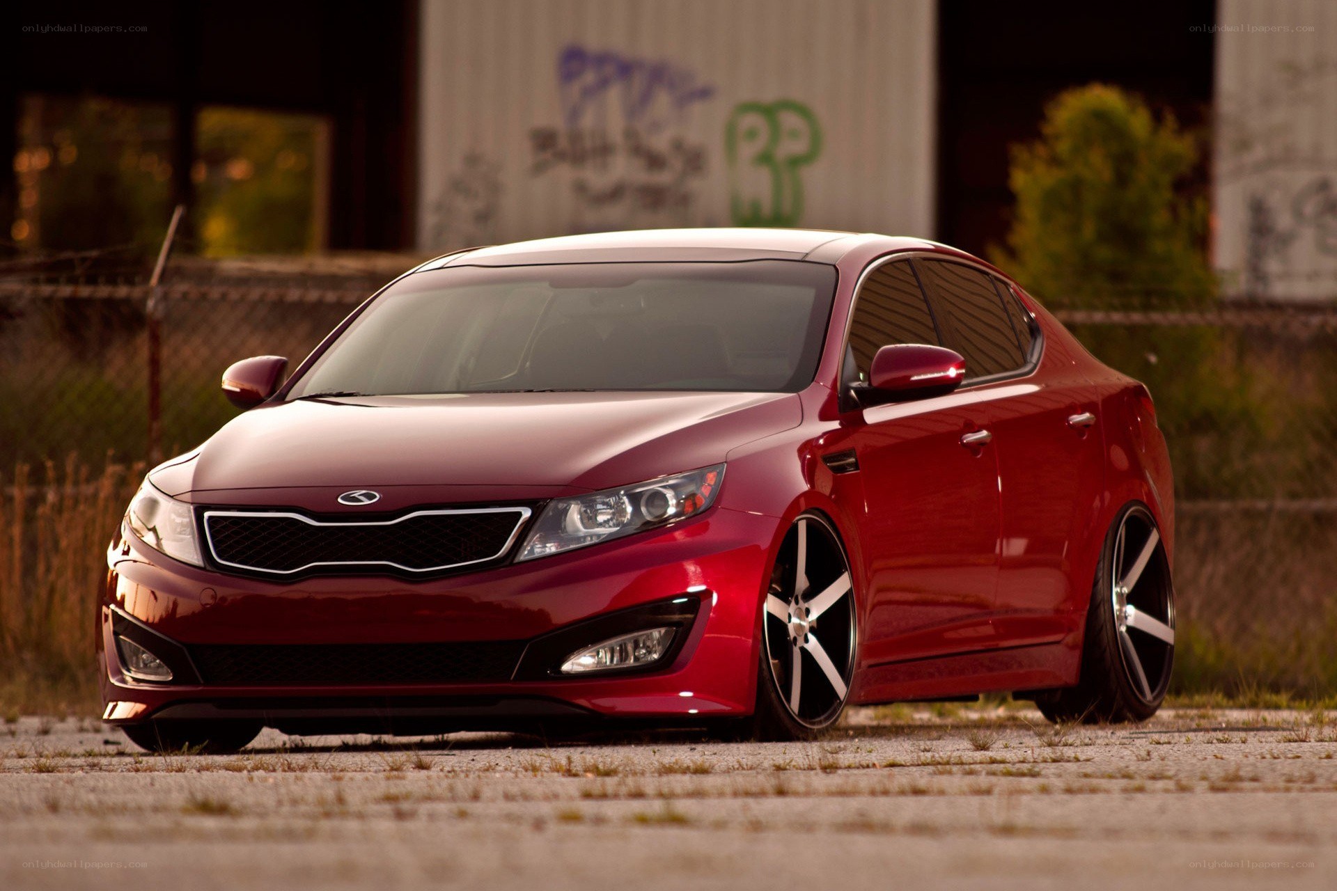 Red Kia Optima sedan