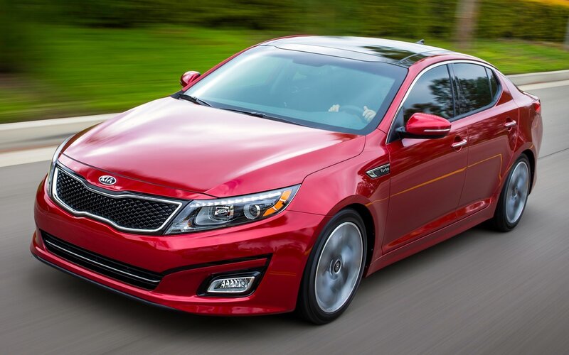 Red Kia Optima Sedan — Dynamic, Afternoon