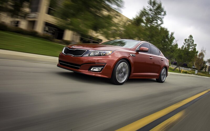 Red Kia Optima Sedan — Dynamic