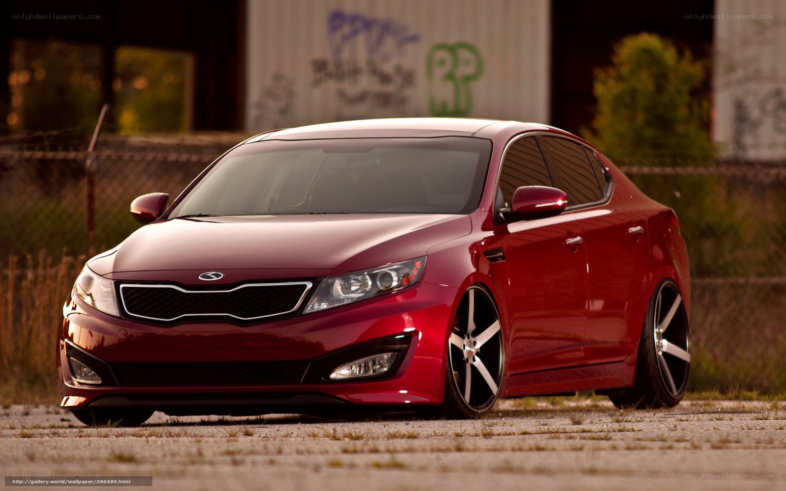 Red Kia Optima sedan
