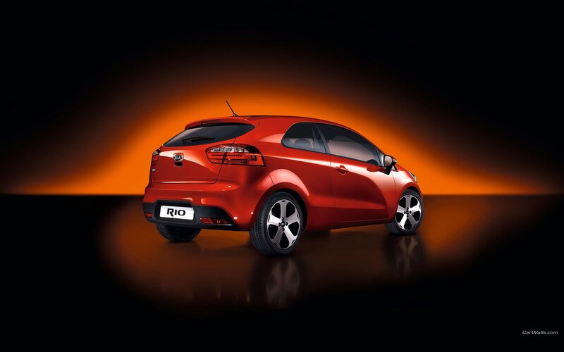 Red Kia Rio Hatchback