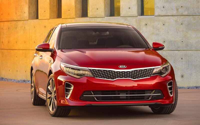 Red Kia Sedan — Dramatic