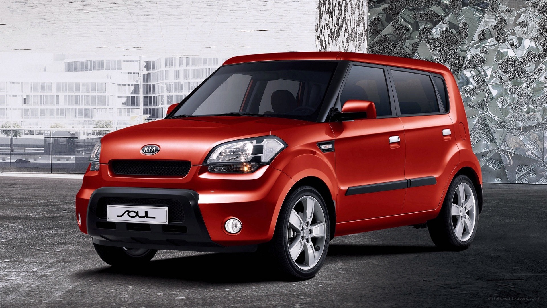 Red Kia Soul compact car