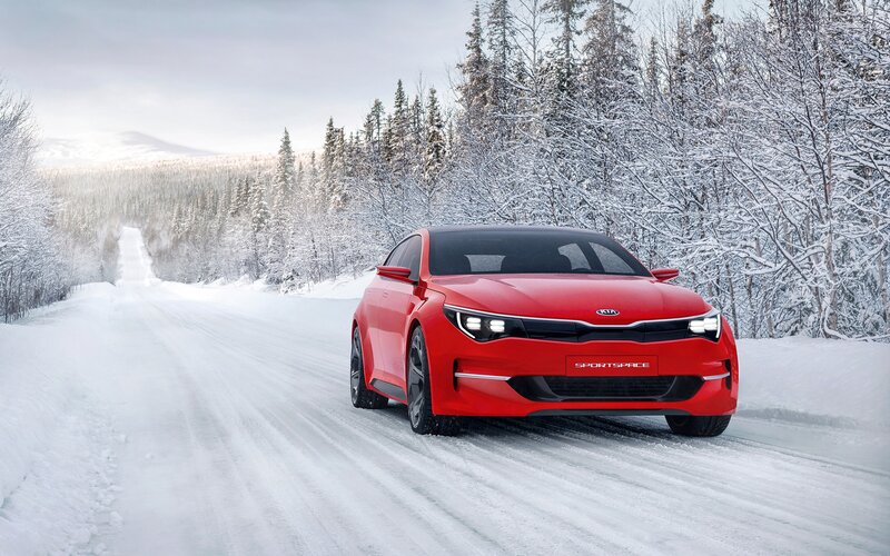 Red Kia Sportspace Car — Cold, Serene