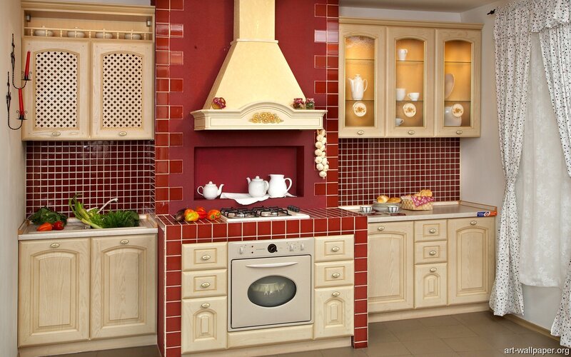 red kitchen with wooden cabinets