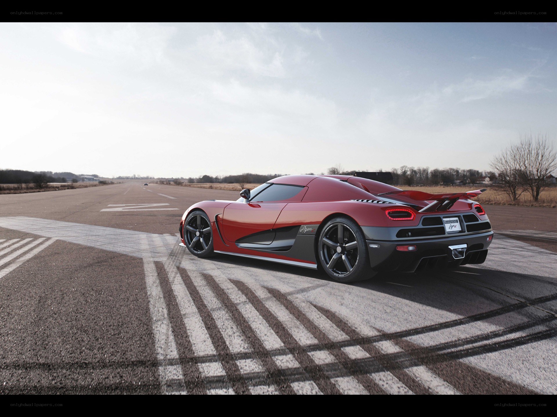 Red Koenigsegg Agera on a runway