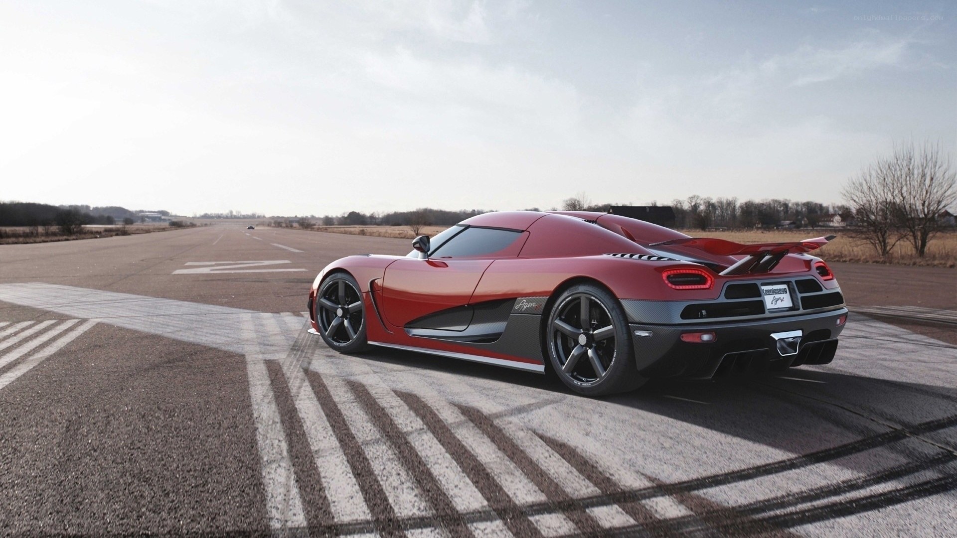 Red Koenigsegg Agera on racetrack