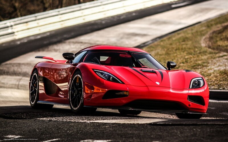 Red Koenigsegg on racetrack