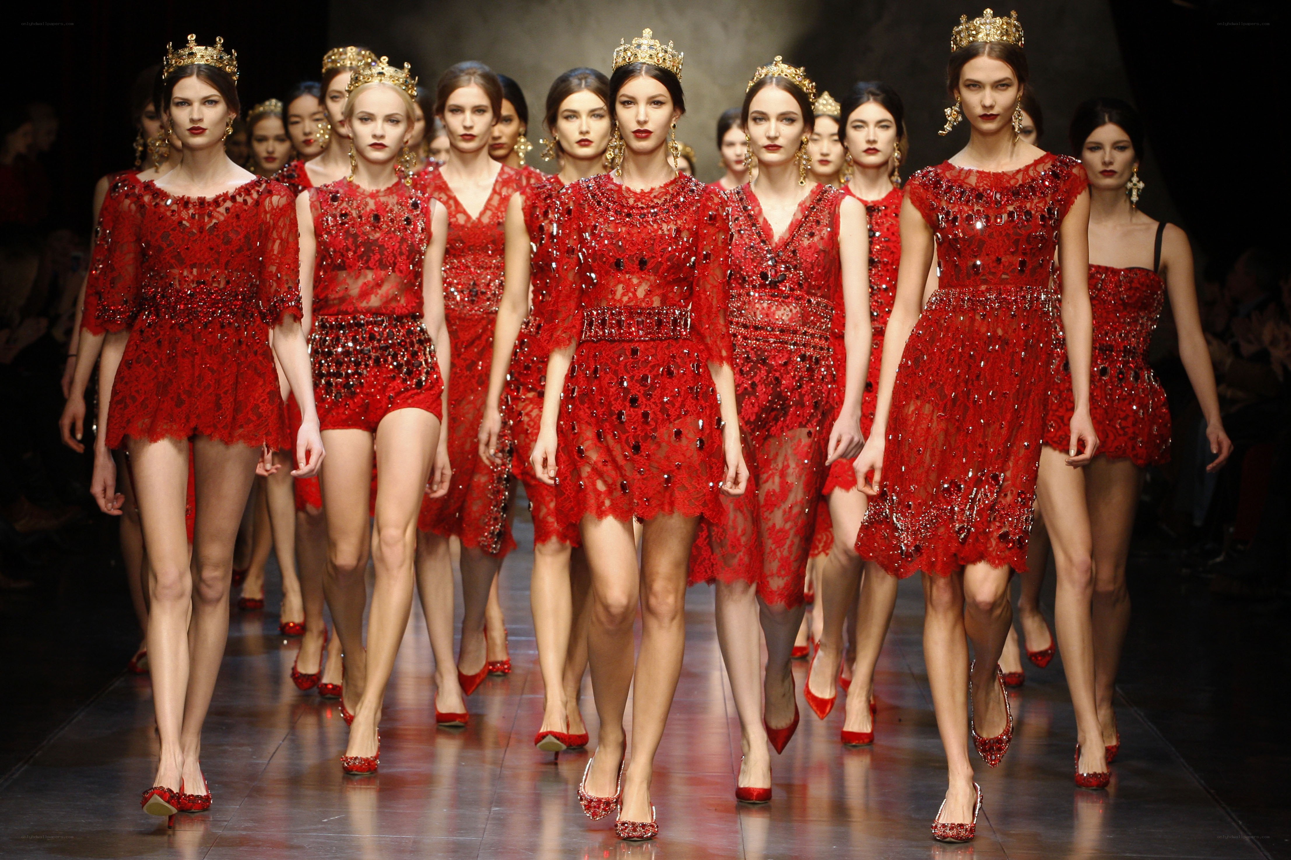 Red lace dresses on runway