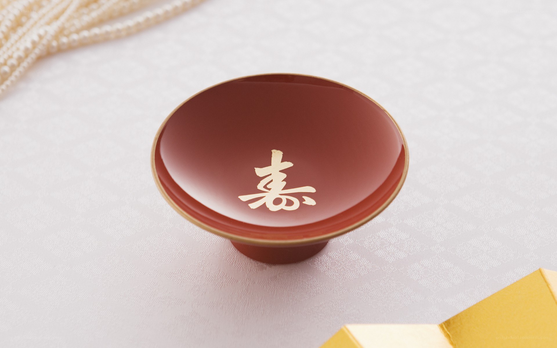 Red lacquer cup with kanji character