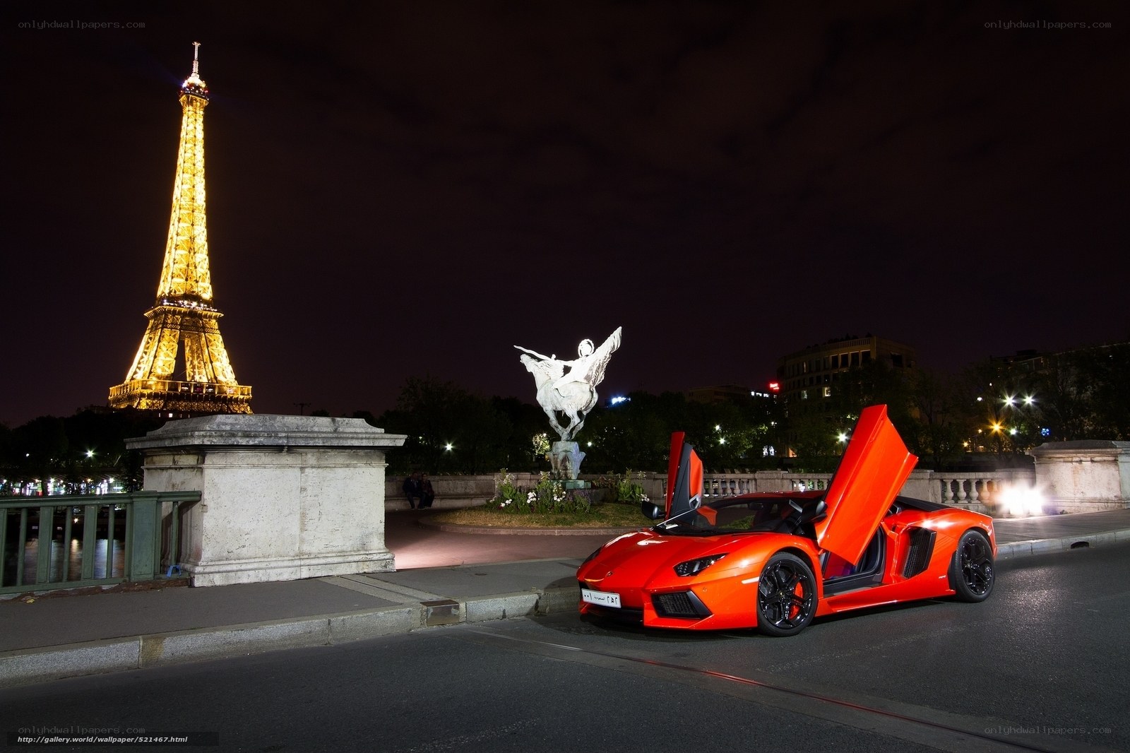 Red Lamborghini at night in Paris