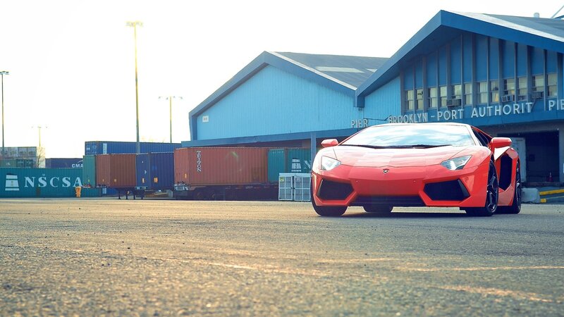 Red Lamborghini at port