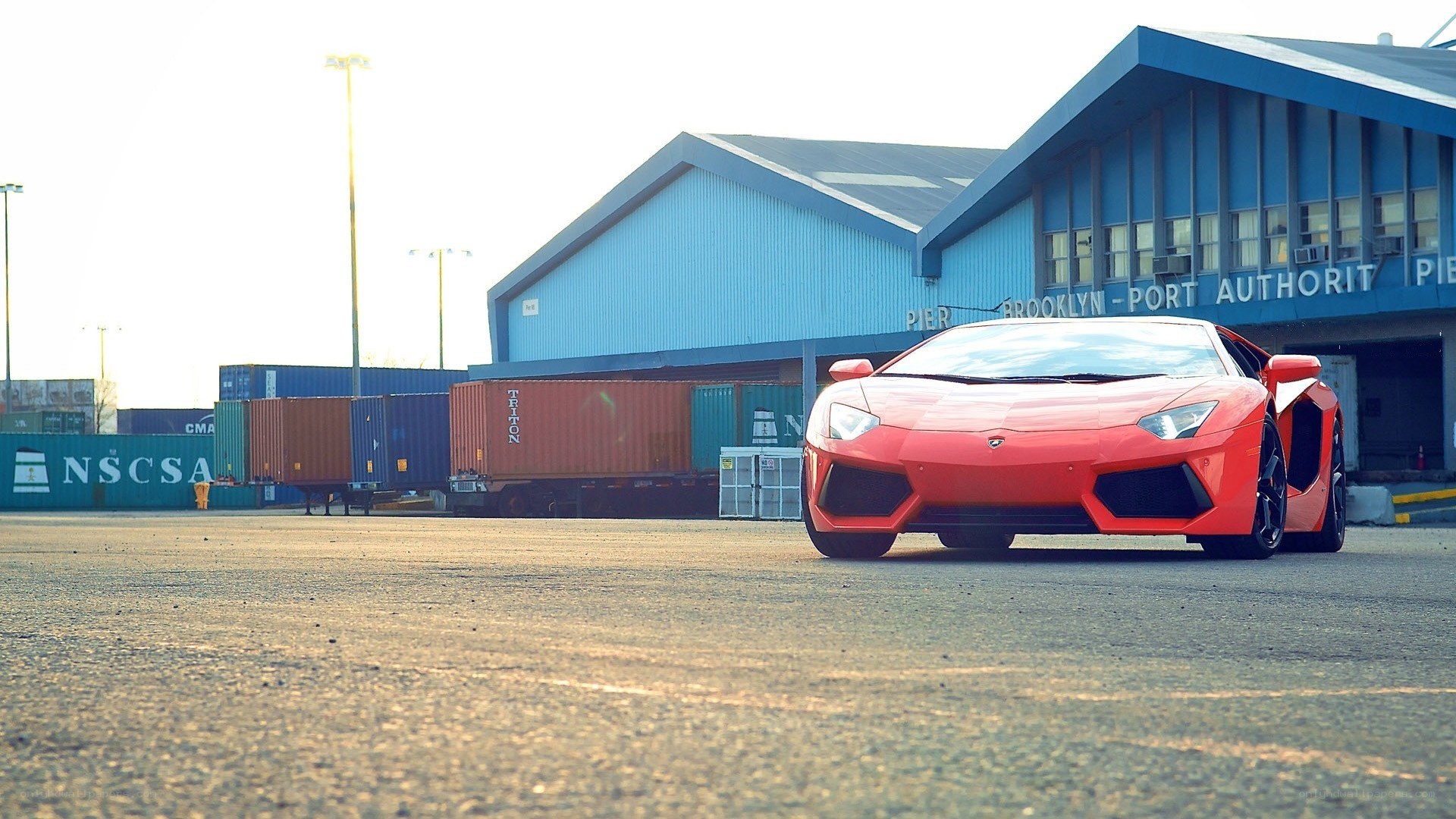 Red Lamborghini at port