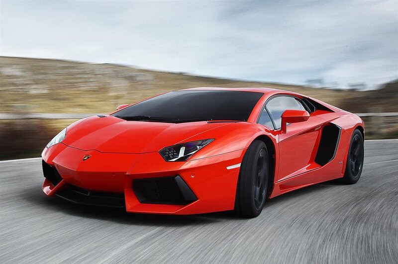 Red Lamborghini Aventador in motion