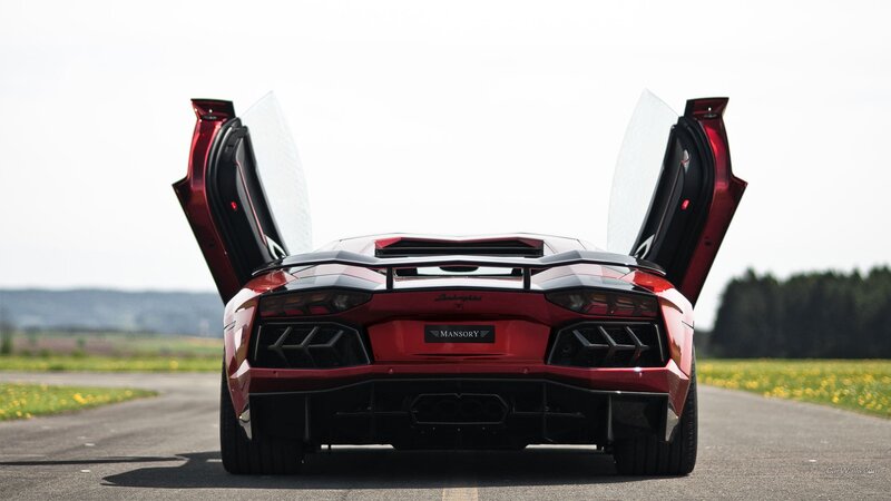 Red Lamborghini Aventador with doors open