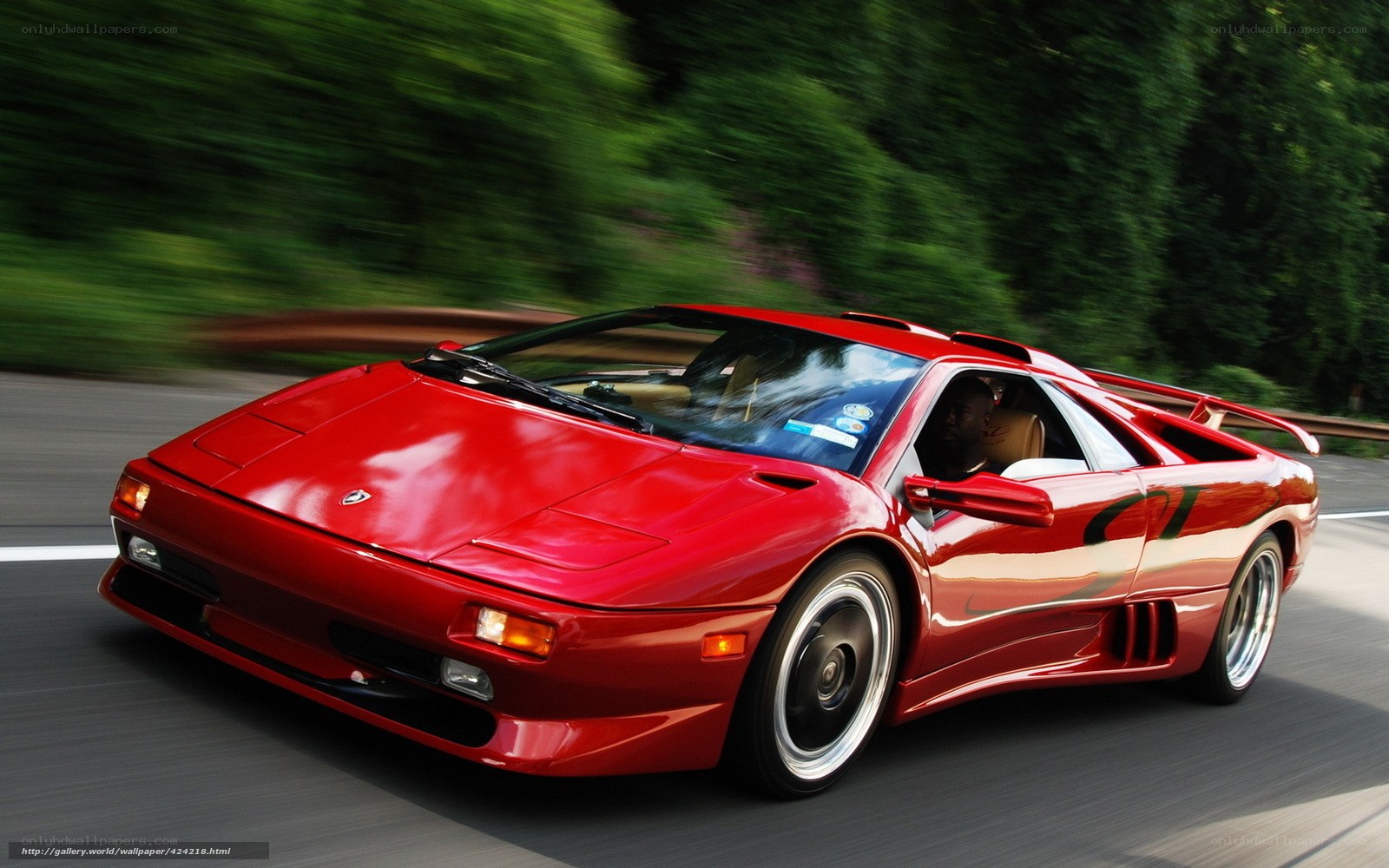 Red Lamborghini Diablo in motion