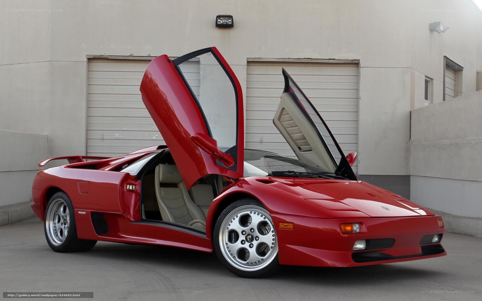 Red Lamborghini Diablo with doors open