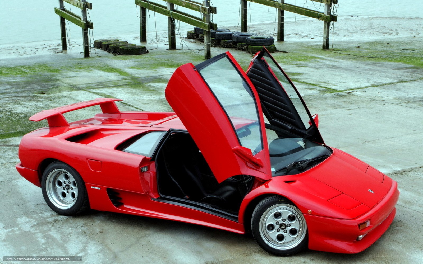 Red Lamborghini Diablo with doors open