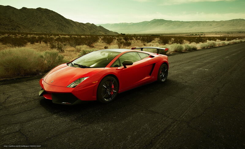 Red Lamborghini in desert
