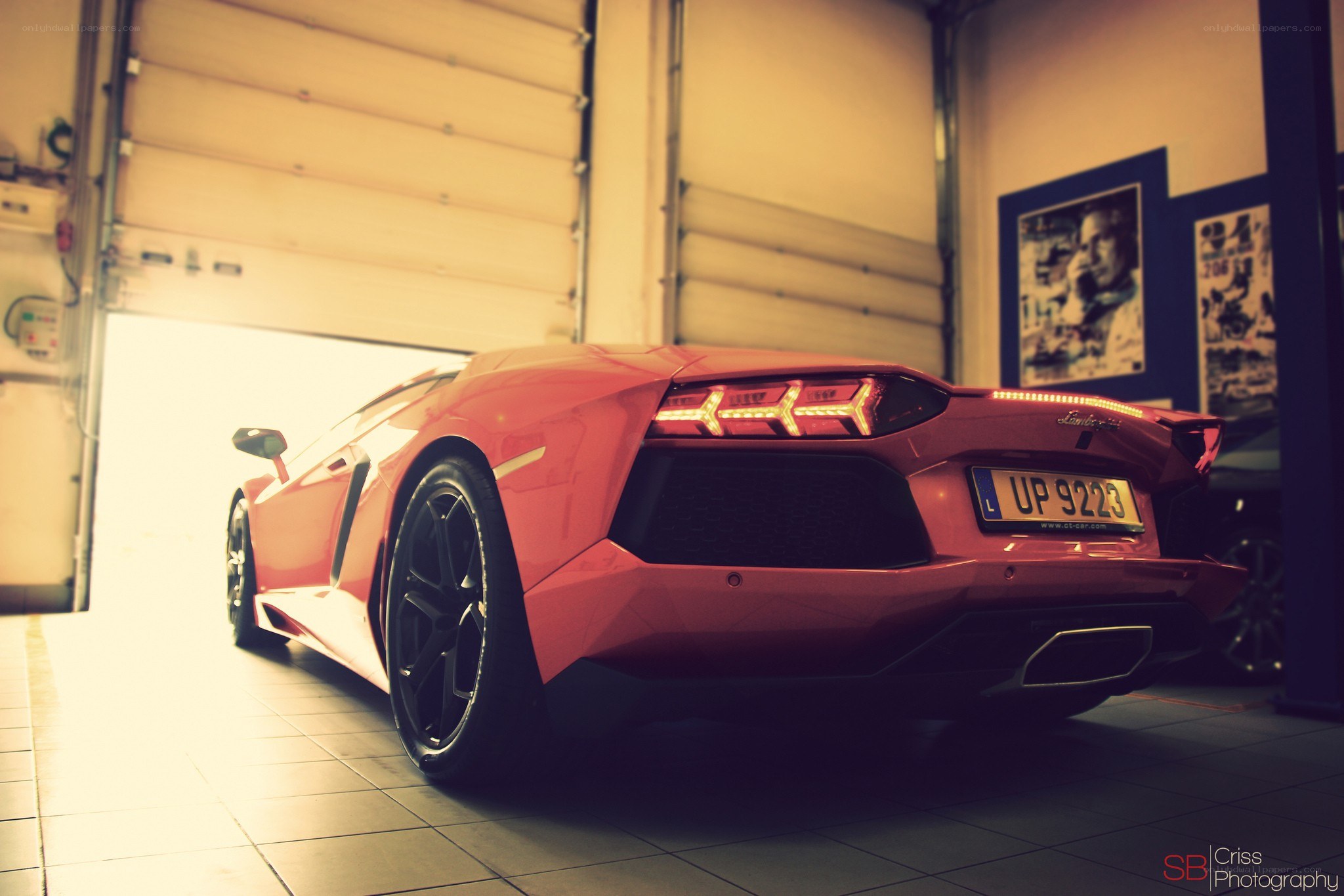 red lamborghini in garage