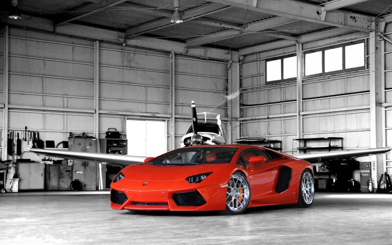 Red Lamborghini in hangar