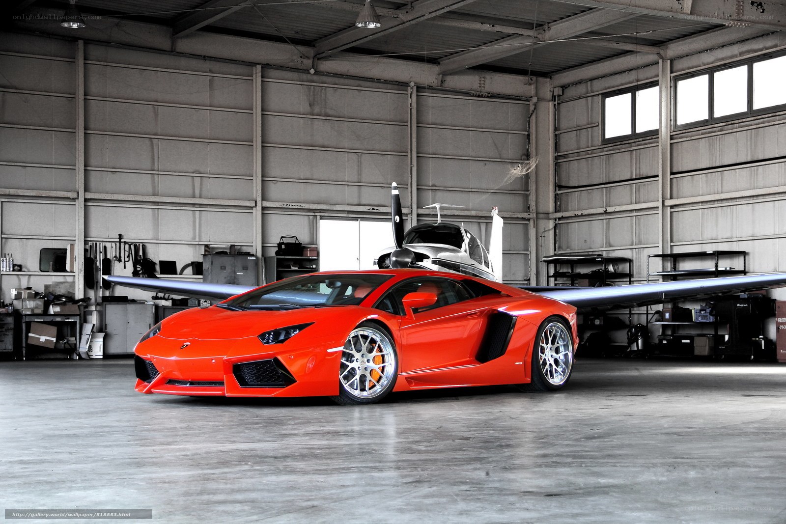 Red Lamborghini in hangar