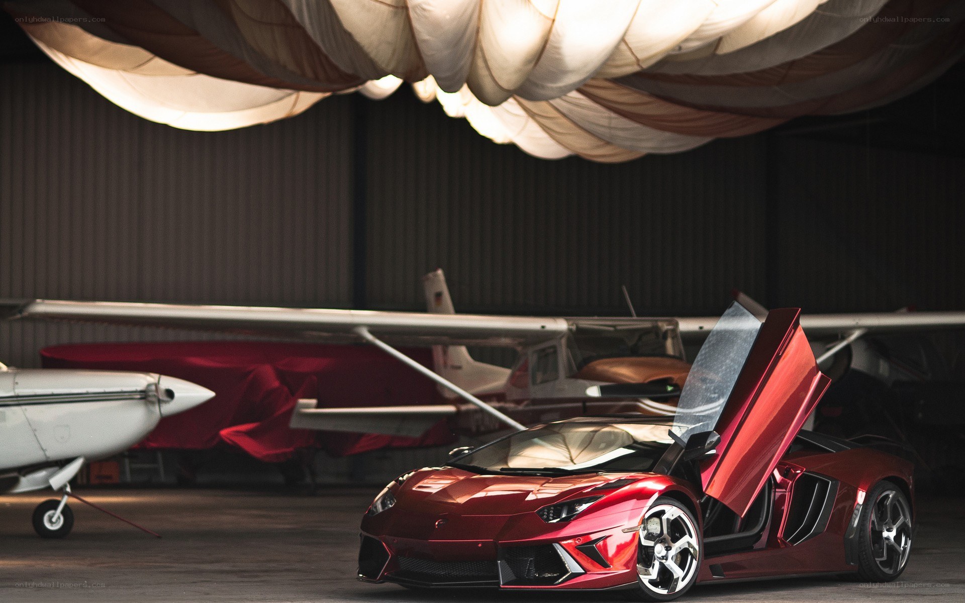 Red Lamborghini in hangar