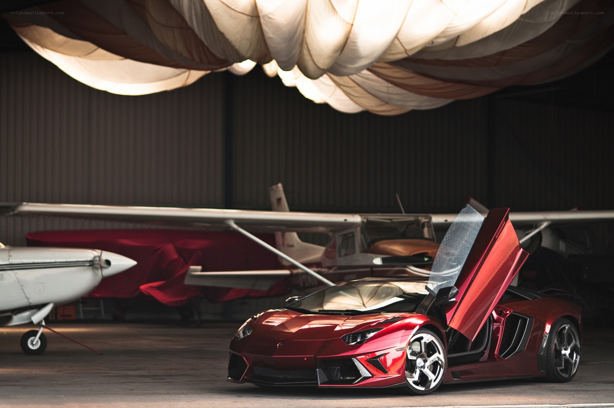 Red Lamborghini in hangar