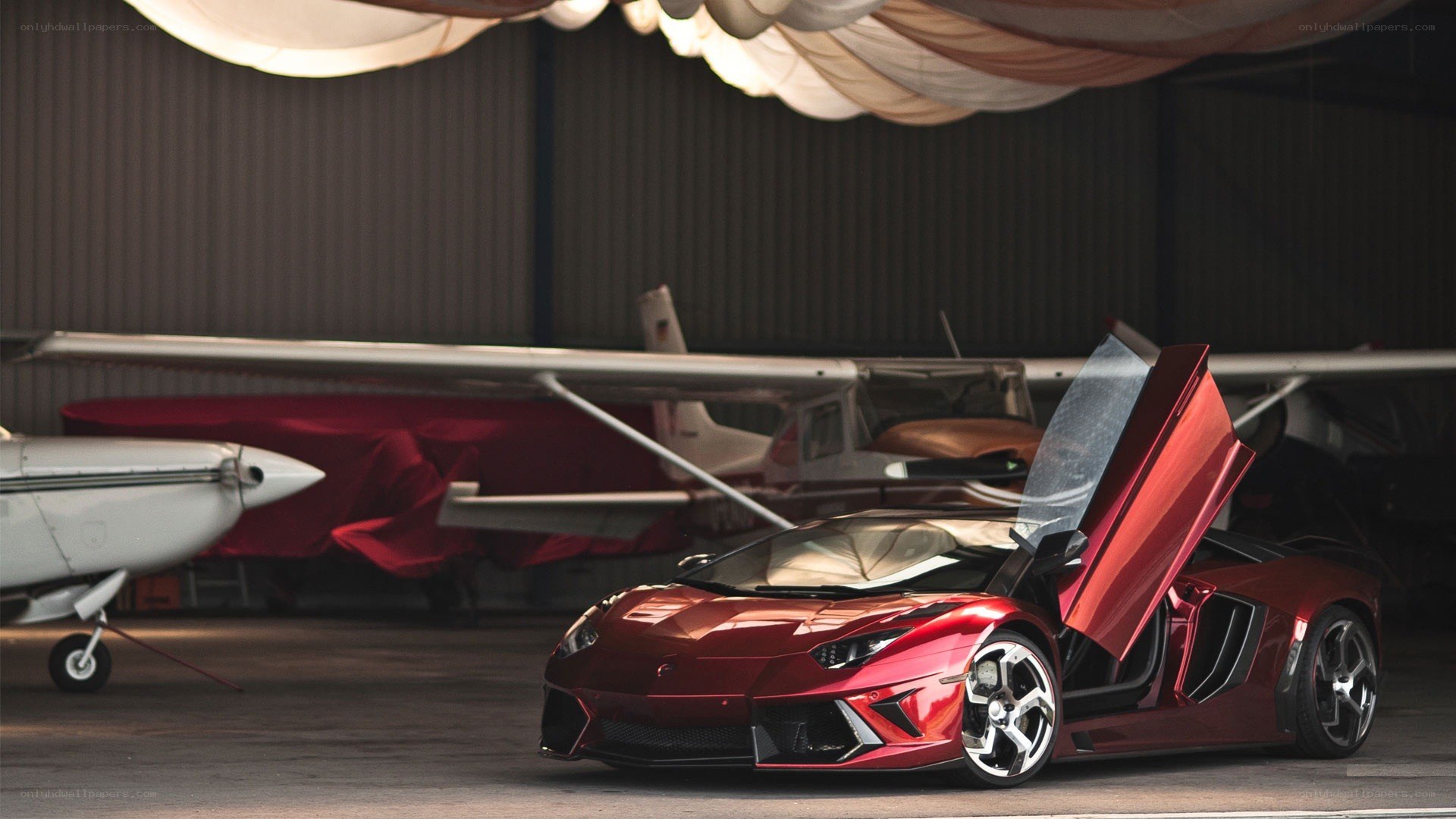 Red Lamborghini in hangar