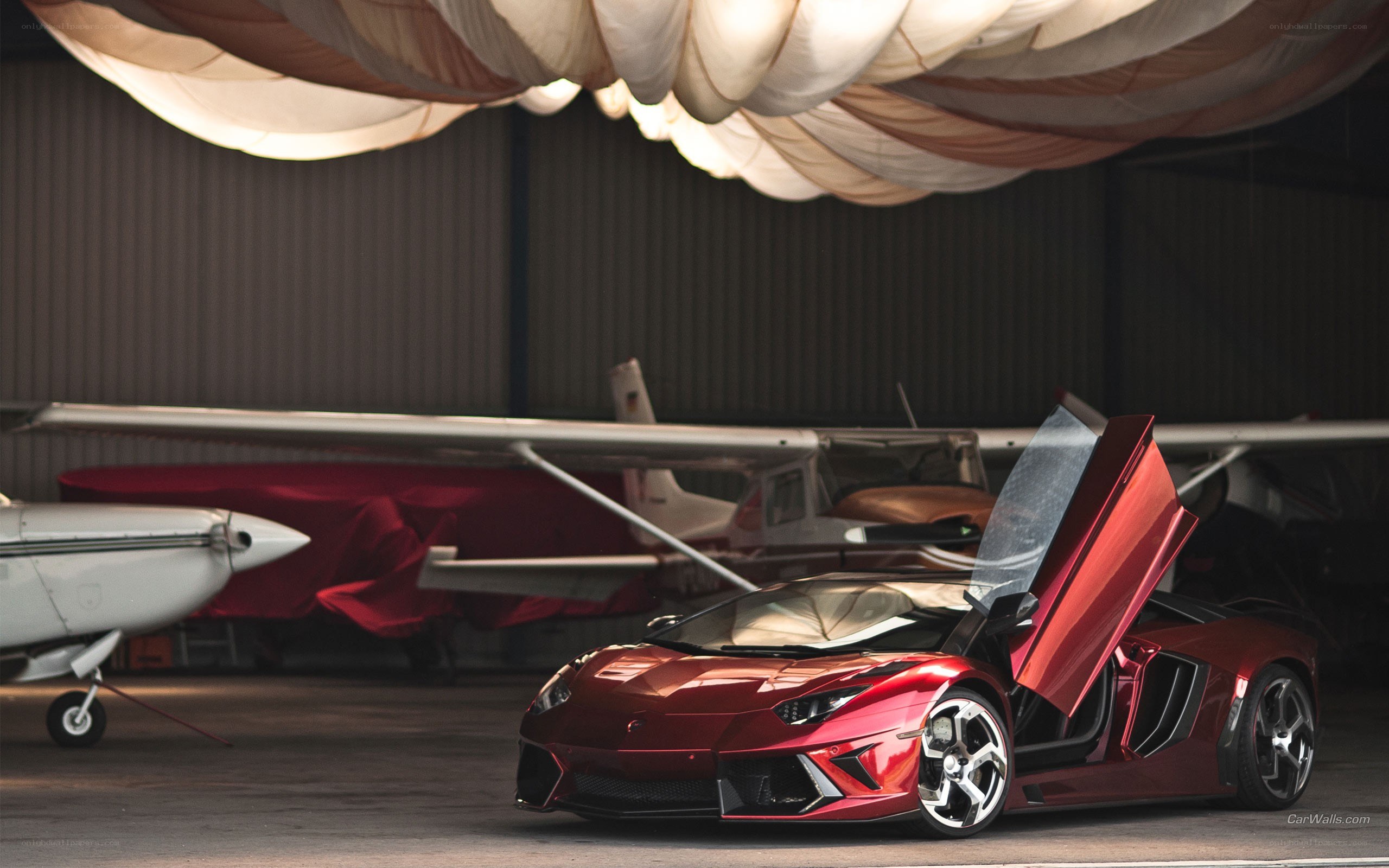 Red Lamborghini in hangar