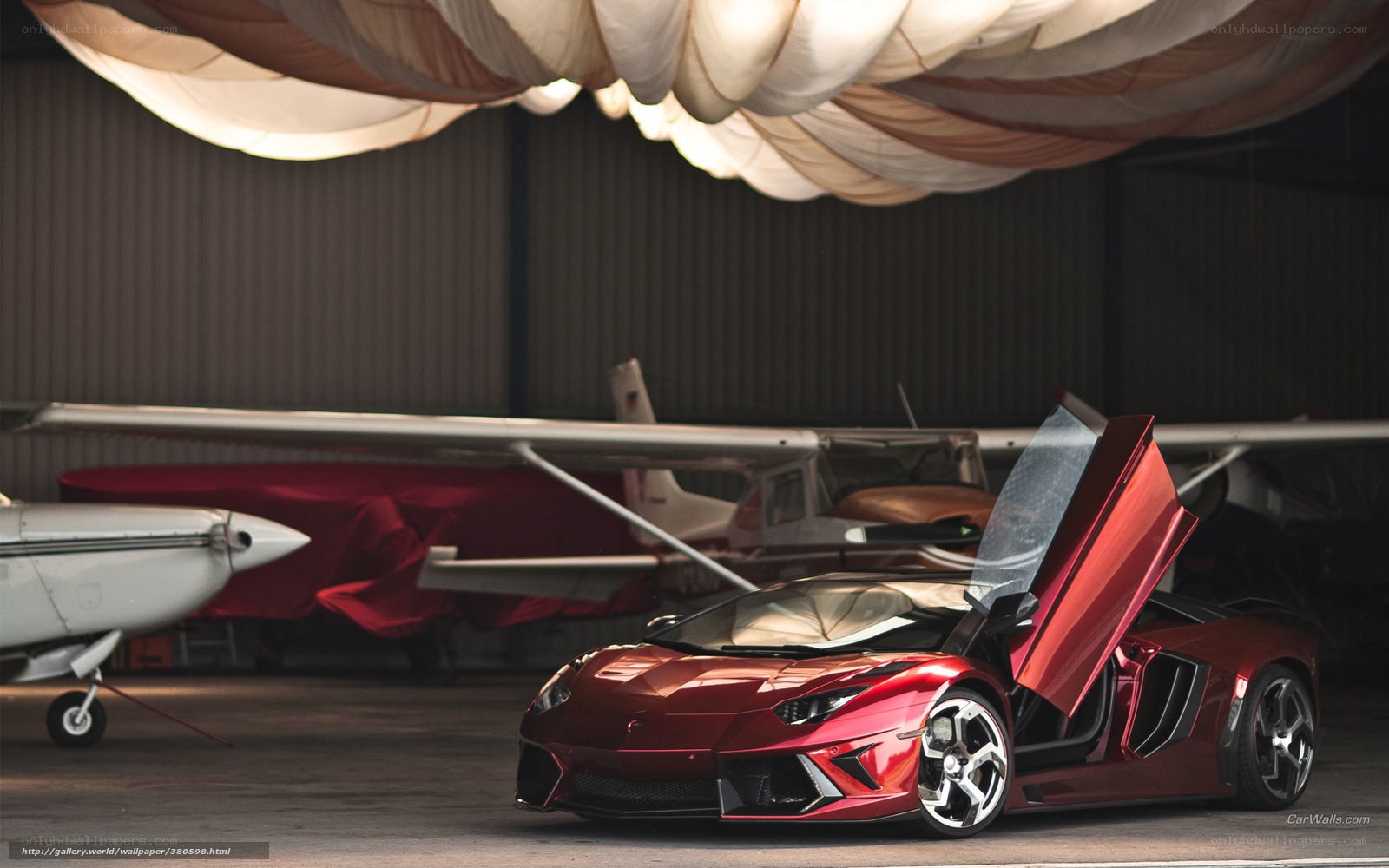 Red Lamborghini in hangar