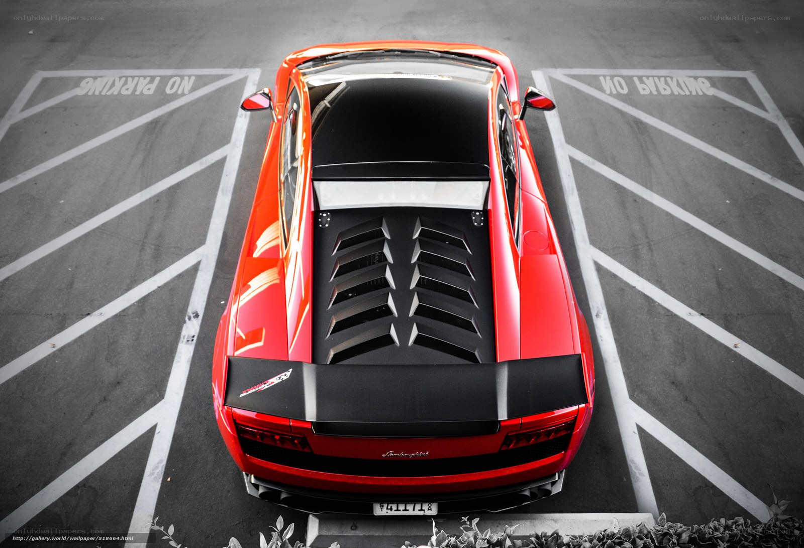 Red Lamborghini in parking spot