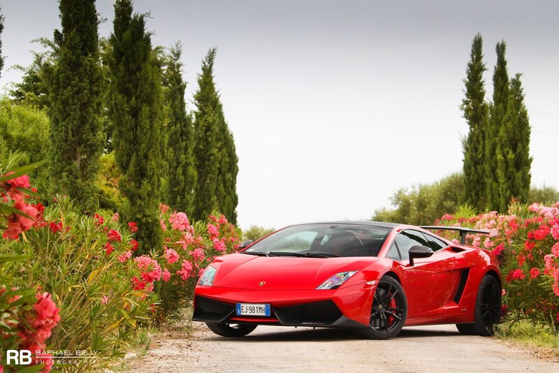 Red Lamborghini on a country road