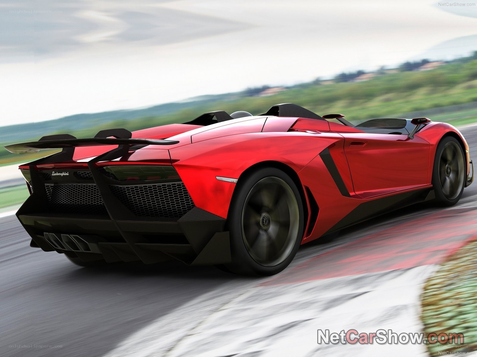Red Lamborghini on a racetrack