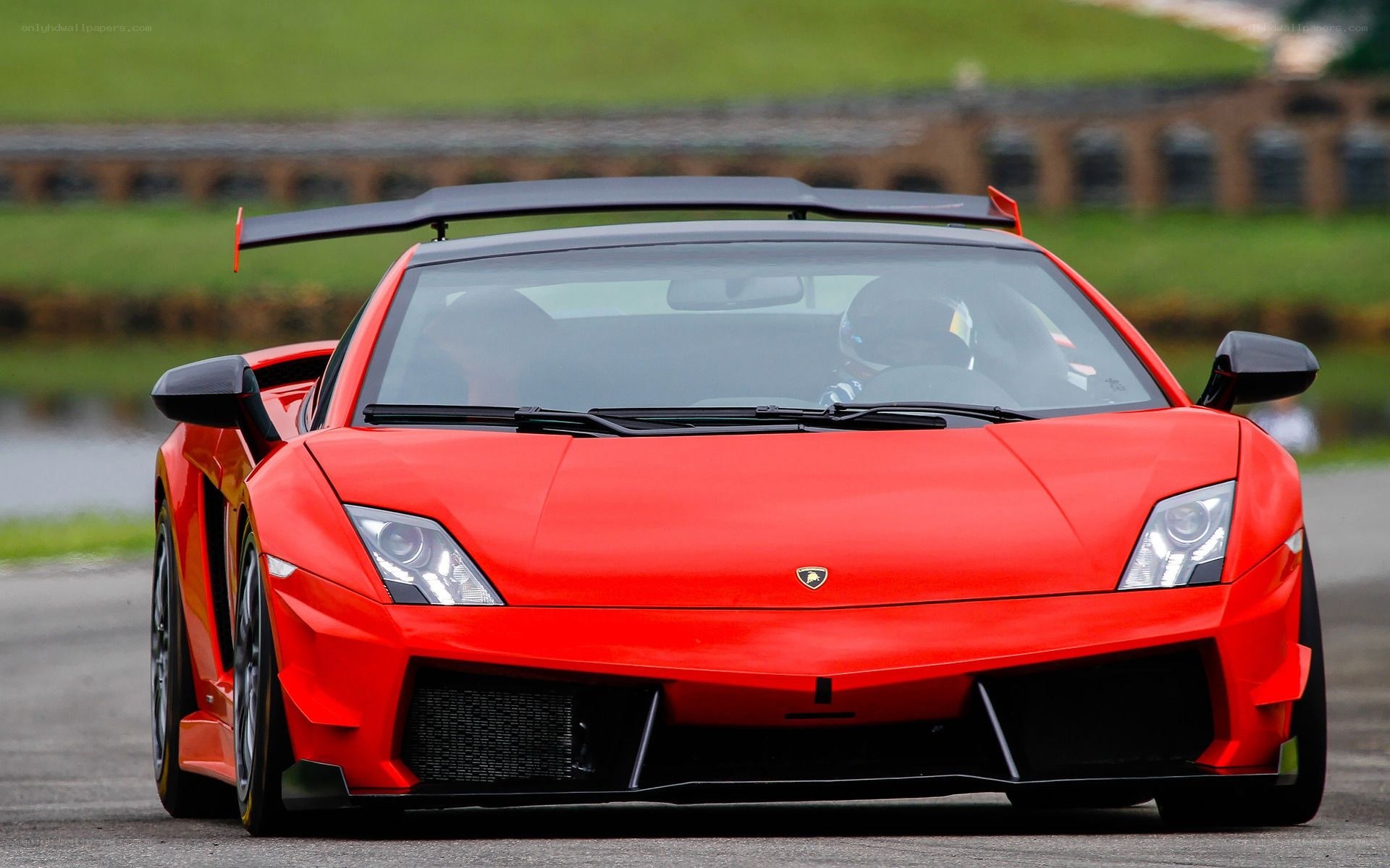 Red Lamborghini on a racetrack